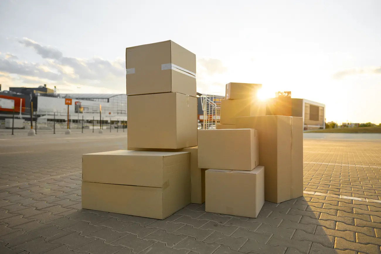 parcel boxes stack on street city waiting for hous 2024 12 02 20 39 55 utc